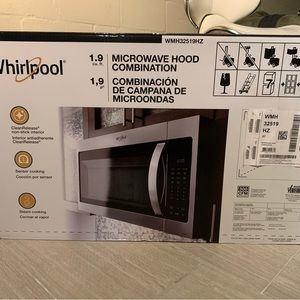 Whirlpool Microwave hood combination brand new sealed